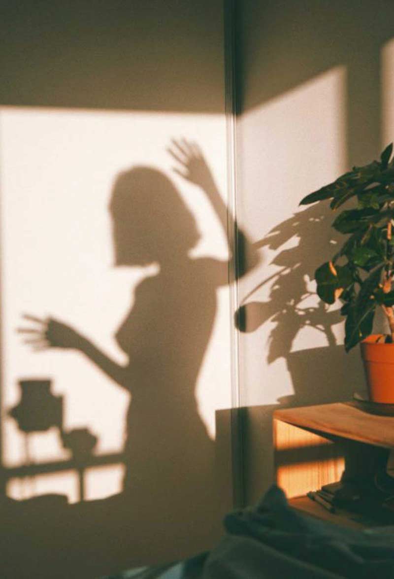 image of the shadow of a girl dance in the light